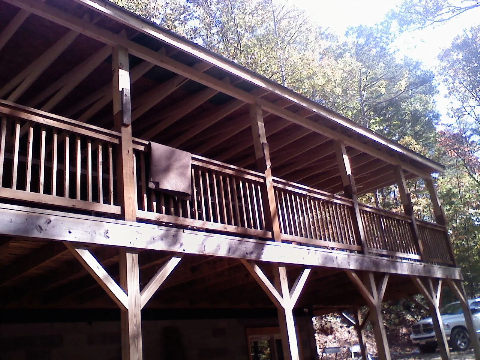 Timber framing under a new elevated porch and deck — Roof Leak Repair in Del Mar by Roofing Brothers